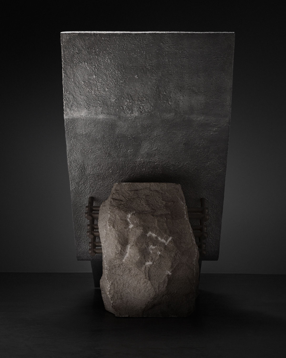 A cast aluminium lounge chair with a heavily textured surface photographed at floor level, its reclined form extending toward the camera against a dark studio background.